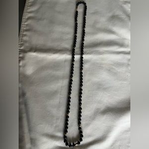 32 inch black onyx necklace 6-6.5 mm with 18 small 14kt gold balls and clasp